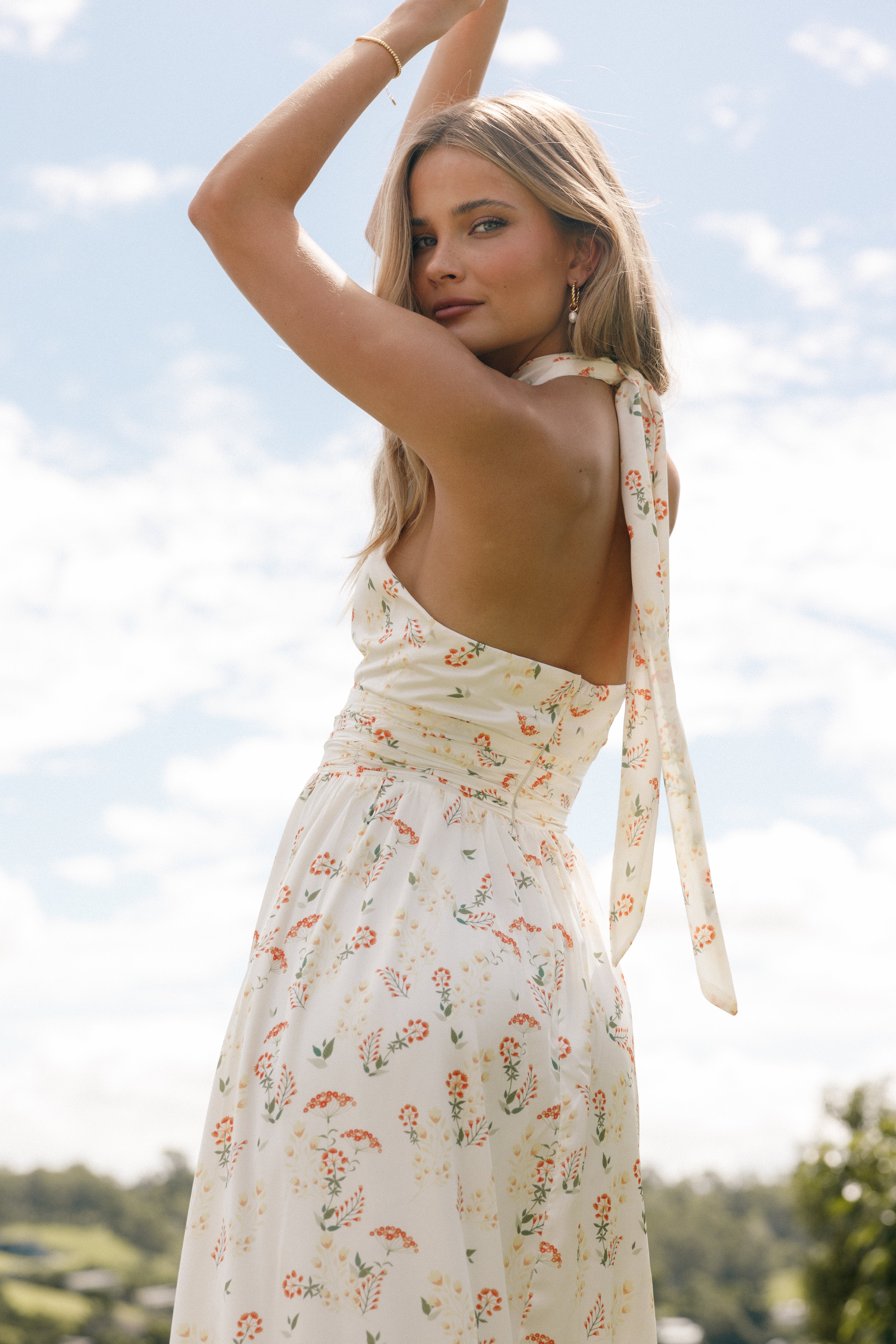 Yellow floral halter dress sales