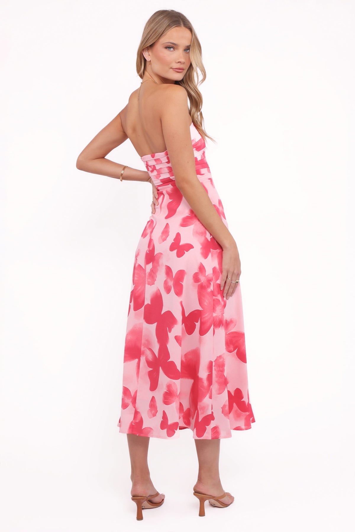 kenna strapless a-line dress Meet the Kenna: A bold halter neck dress that elevates everyday.