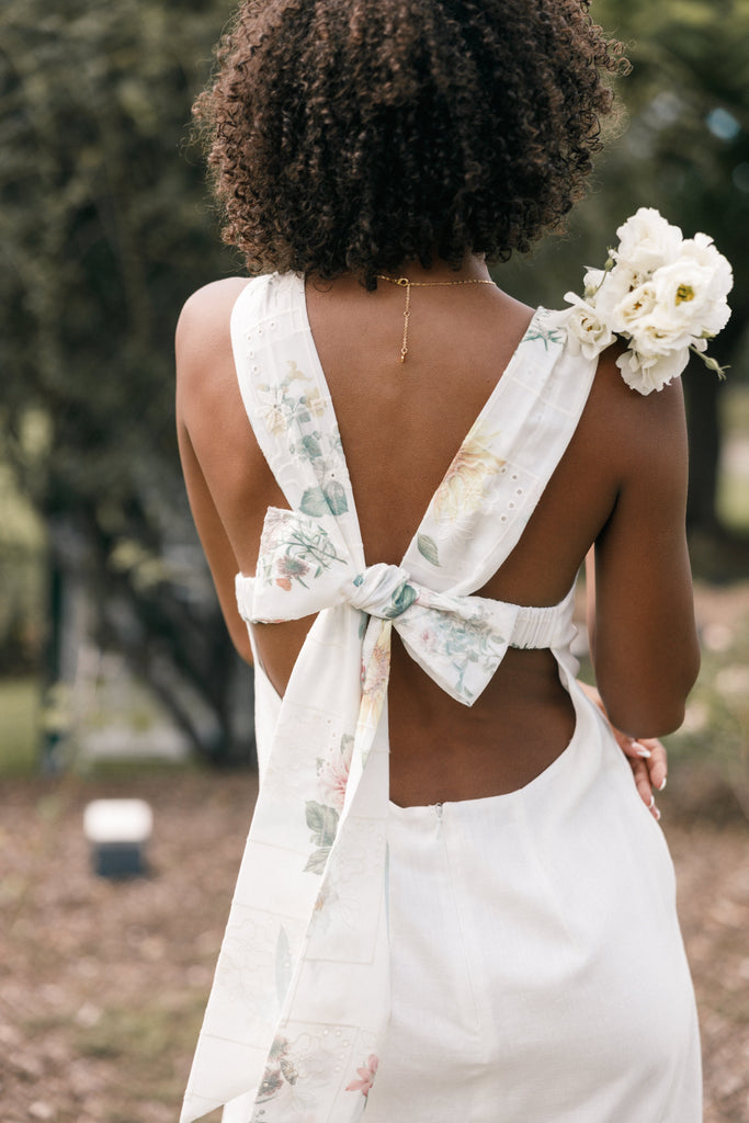 Off White Strapless Dress With Back Bow Detail · Filly Flair