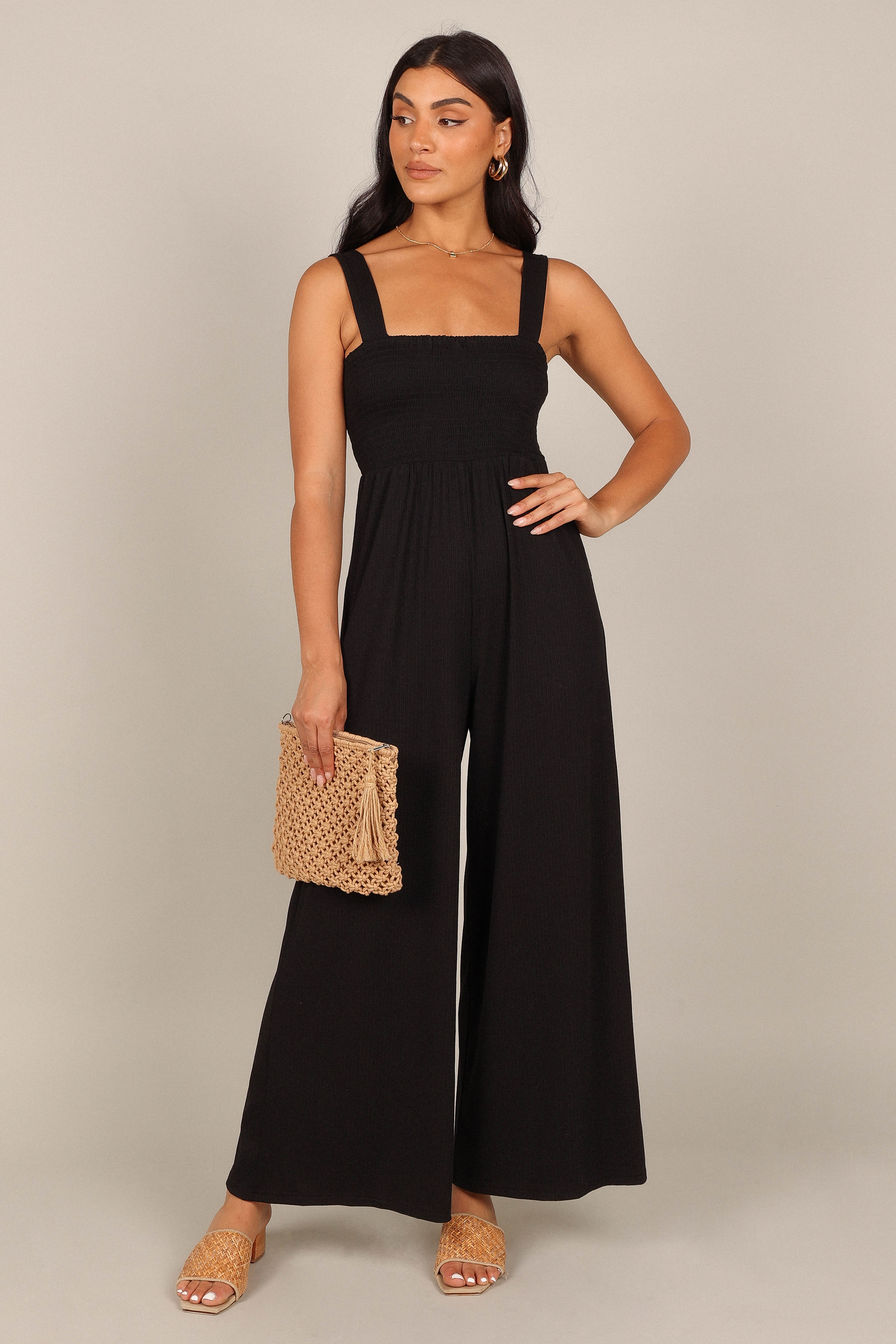 https://petalandpup.com/cdn/shop/products/petal-and-pup-usa-jumpsuits-kippa-stretch-jumpsuit-black-33446703071409.jpg?v=1680115420